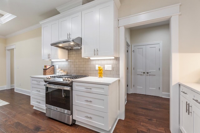 kitchen with white cabinets, dark hardwood / wood-style flooring, and stainless steel gas range