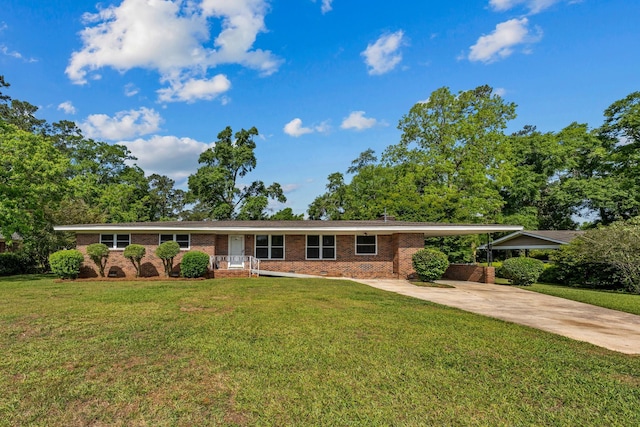 1106 Richardson Rd, Tallahassee, FL 32301 - single story home with a front yard, driveway, and brick siding