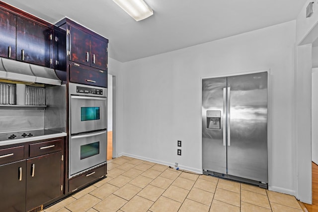 1106 Richardson Rd, Tallahassee, FL 32301 - kitchen featuring baseboards, light countertops, and stainless steel appliances
