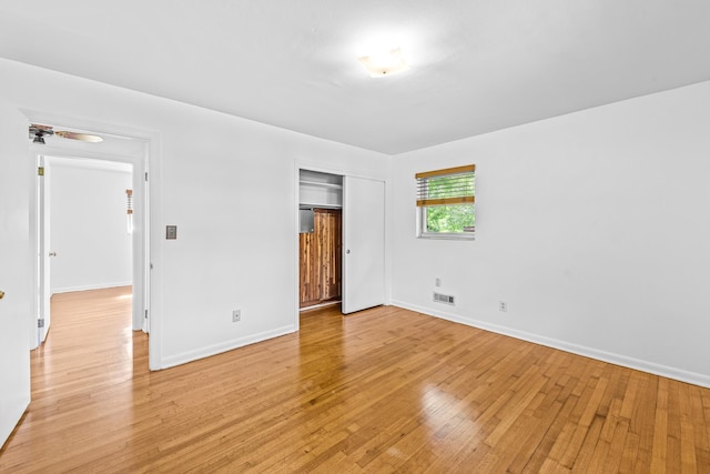 1106 Richardson Rd, Tallahassee, FL 32301 - unfurnished bedroom featuring light wood-style floors, baseboards, visible vents, and a closet