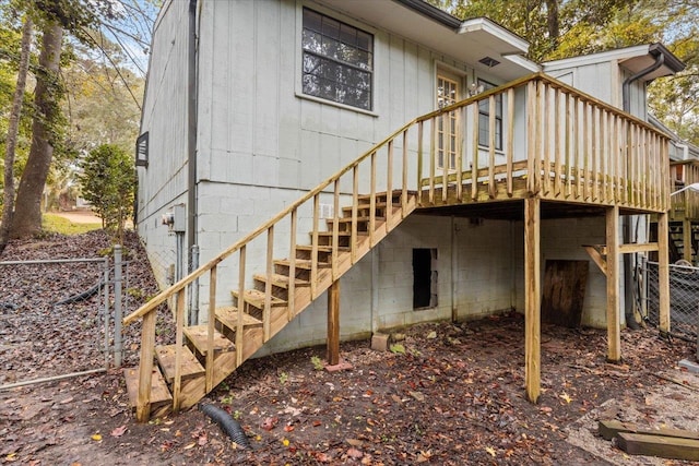 back of house featuring a deck