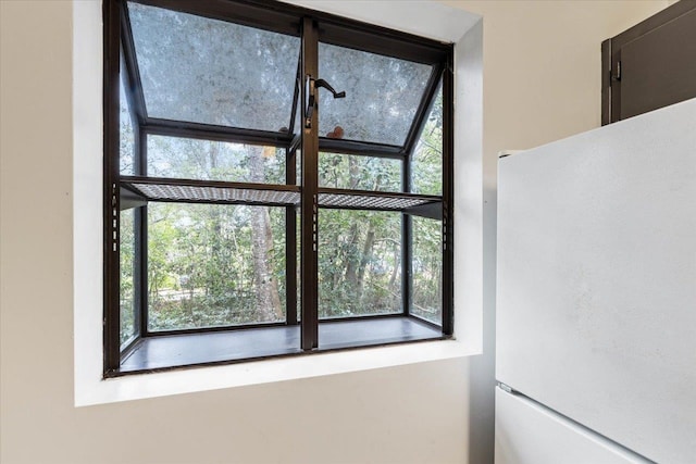 interior details featuring white refrigerator