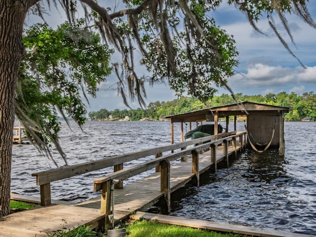 view of dock with a water view