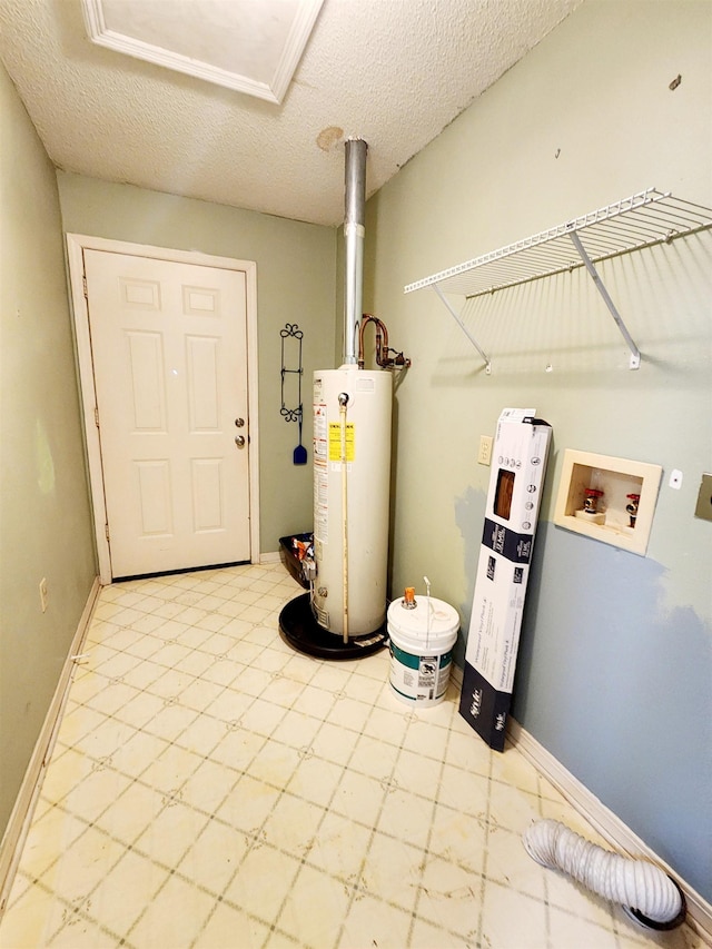 utility room featuring water heater