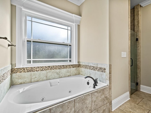 bathroom featuring shower with separate bathtub and tile patterned floors