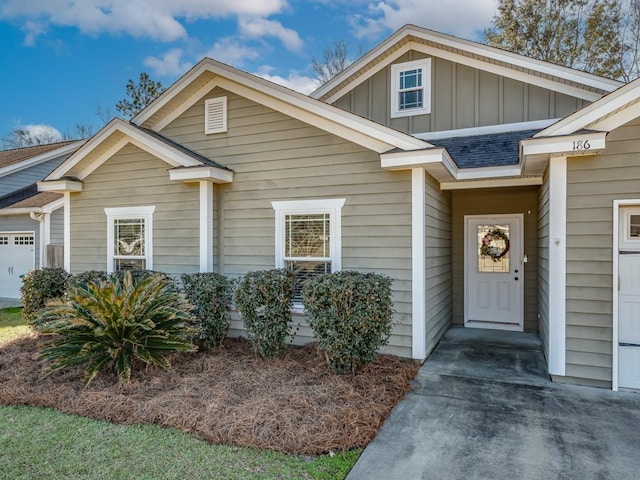 property entrance featuring a garage