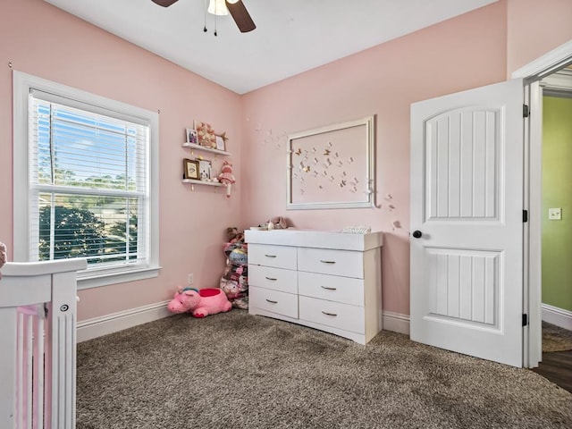 carpeted bedroom with ceiling fan