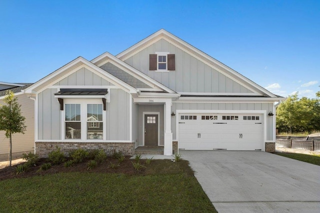 craftsman-style house with a garage and a front yard