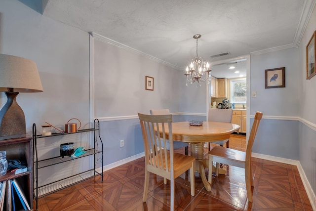 1625 Centerville Rd Unit 20, Tallahassee, FL 32308 - dining room featuring a chandelier and ornamental molding