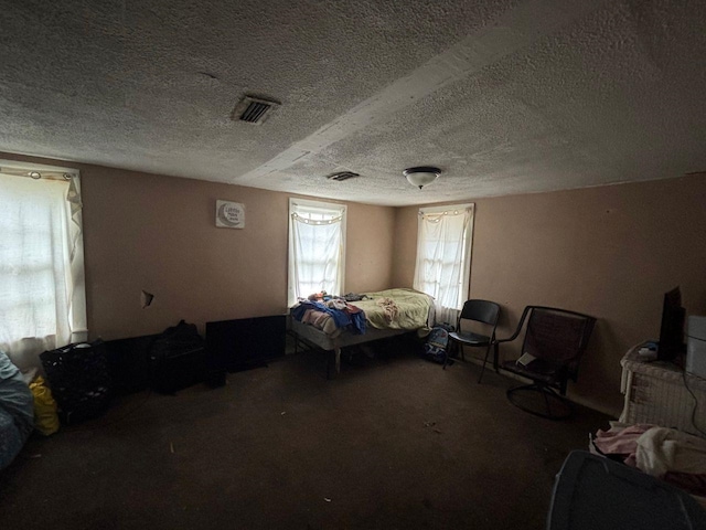 bedroom with a textured ceiling