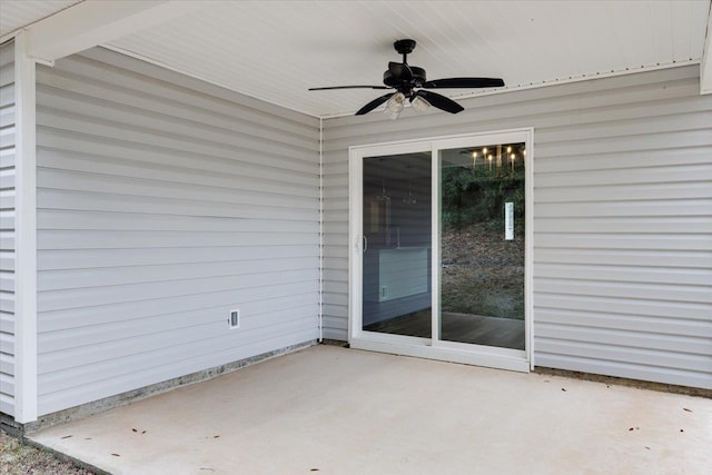 view of patio featuring ceiling fan