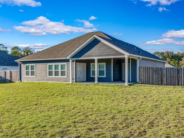 view of front of property featuring a patio area and a front lawn