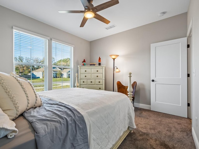 carpeted bedroom with ceiling fan