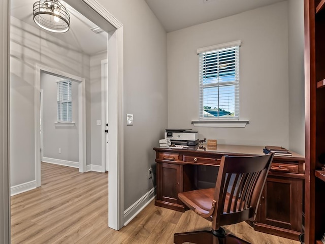 office area with light wood-type flooring