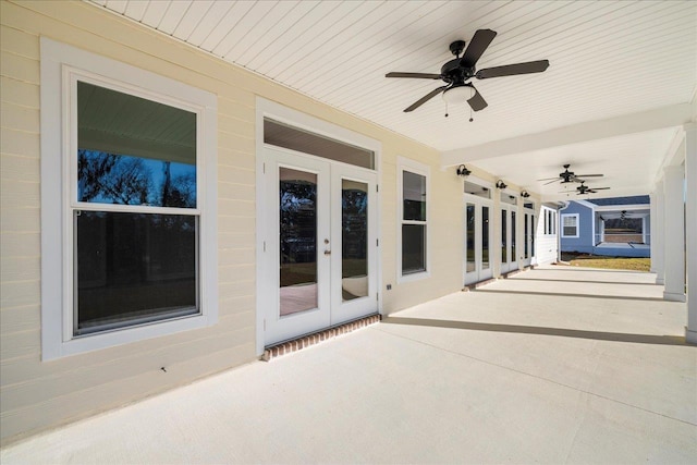 view of patio with french doors and ceiling fan