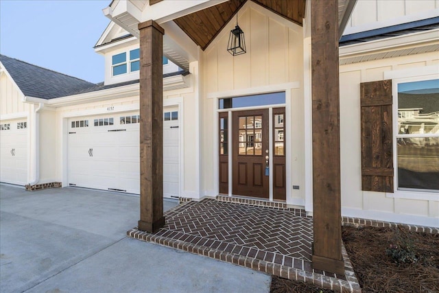 doorway to property featuring a garage