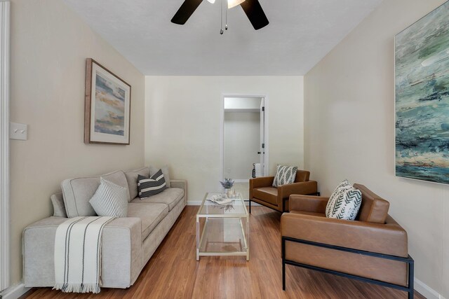 2917 Greenon Ln, Tallahassee, FL 32304 - living area with ceiling fan, wood finished floors, and baseboards