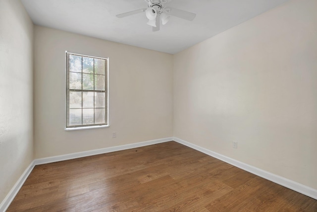 2917 Greenon Ln, Tallahassee, FL 32304 - empty room featuring wood finished floors, baseboards, and a ceiling fan