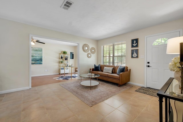 2917 Greenon Ln, Tallahassee, FL 32304 - living area with healthy amount of natural light, baseboards, and ceiling fan
