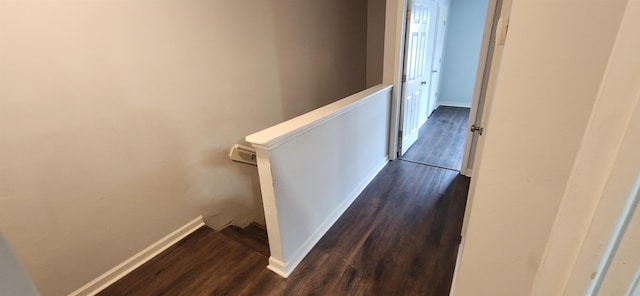 hall featuring dark wood-type flooring