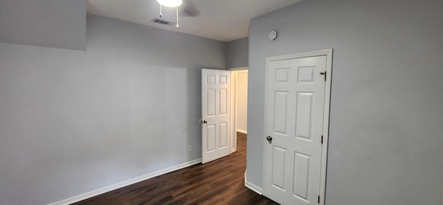 interior space with dark hardwood / wood-style floors