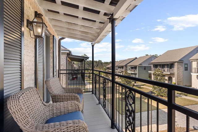 balcony featuring a residential view