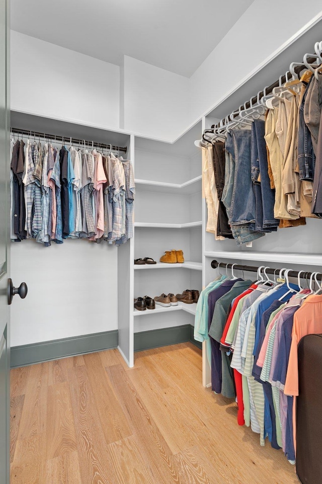 spacious closet featuring wood finished floors