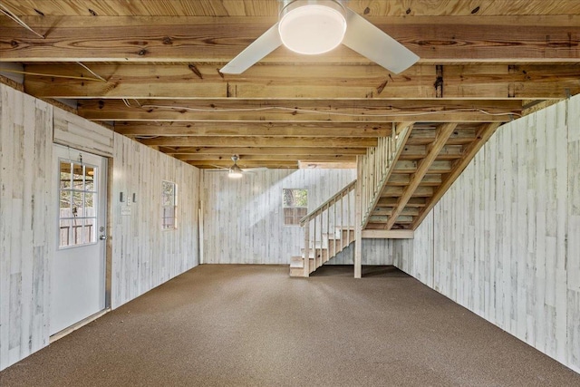 310 Glenridge Rd, Perry, FL 32348 - below grade area with carpet floors, a ceiling fan, stairway, and plenty of natural light