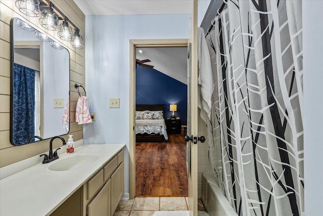 310 Glenridge Rd, Perry, FL 32348 - ensuite bathroom with vanity, shower / bath combination with curtain, and a textured ceiling