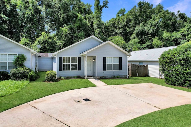 ranch-style home with a front lawn