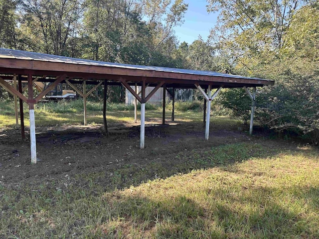 view of yard featuring a carport