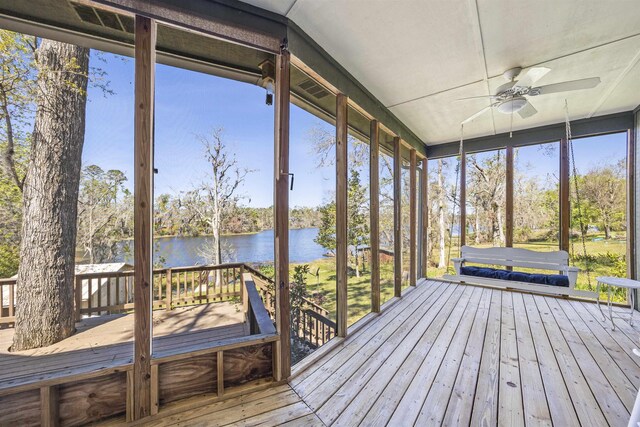 view of front of house featuring a carport and a sunroom