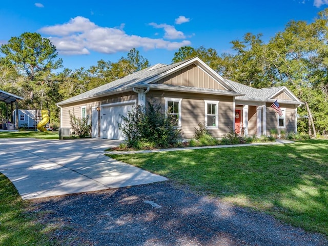 craftsman-style house with a garage and a front yard