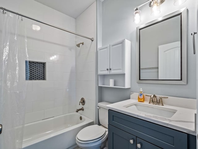 full bathroom featuring vanity, toilet, and shower / bath combo with shower curtain