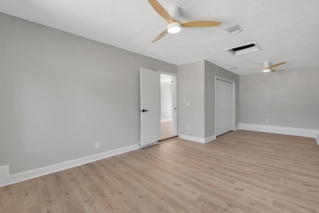 unfurnished room featuring ceiling fan and light hardwood / wood-style flooring