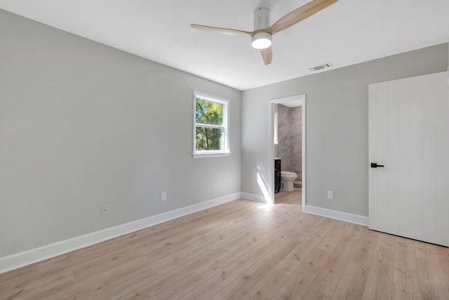 empty room featuring light hardwood / wood-style floors and ceiling fan