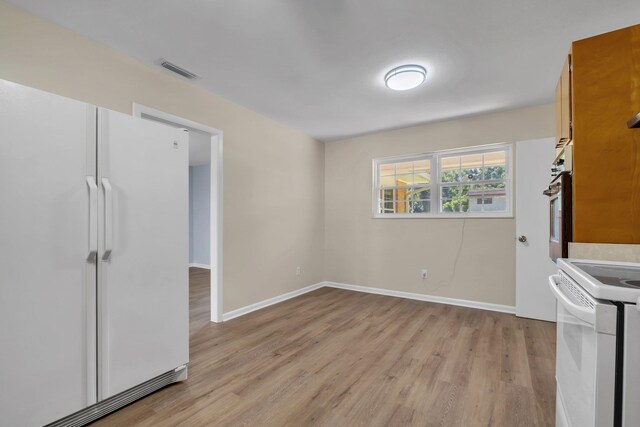 dining room featuring light hardwood / wood-style floors