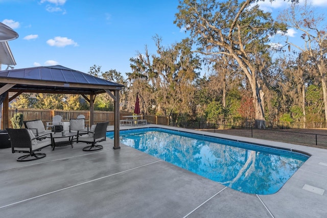 view of pool with a gazebo and a patio area