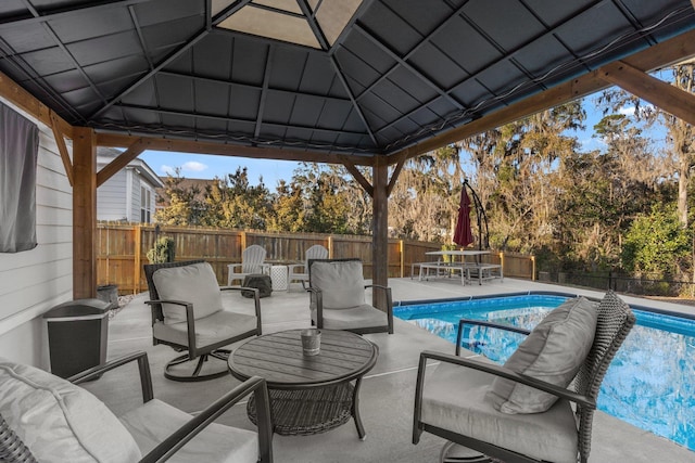 view of pool featuring a gazebo and an outdoor hangout area