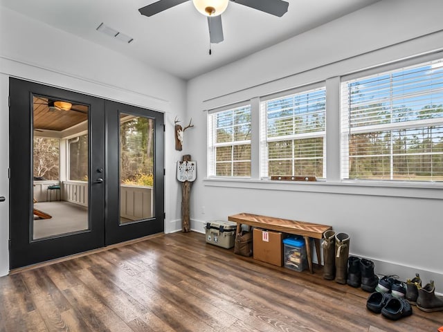 entryway featuring visible vents, a ceiling fan, wood finished floors, and french doors