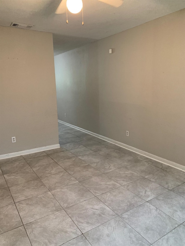 spare room featuring ceiling fan