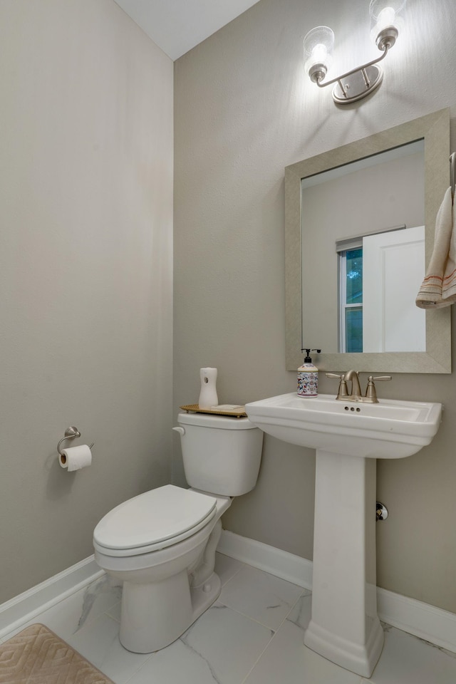 624 W 7th Ave Unit 1And 2, Tallahassee, FL 32303 - bathroom with toilet and marble finish flooring