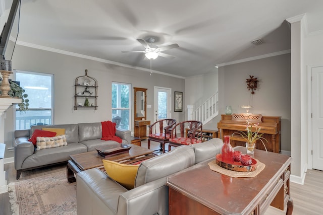 624 W 7th Ave Unit 1And 2, Tallahassee, FL 32303 - living room with stairs, light wood finished floors, a ceiling fan, and ornamental molding
