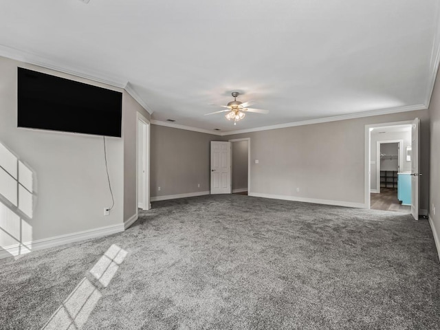 unfurnished living room featuring carpet floors, ceiling fan, baseboards, and ornamental molding