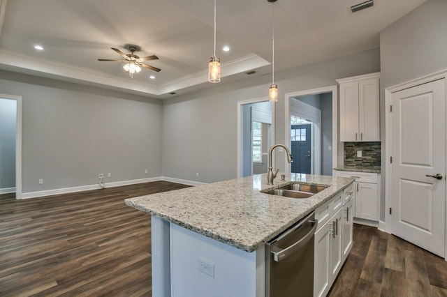 kitchen featuring dishwasher, sink, dark hardwood / wood-style floors, a kitchen island with sink, and white cabinets