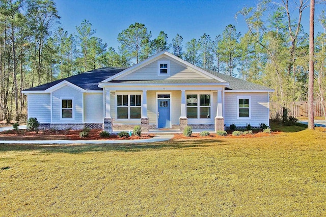 view of front of home featuring a front lawn and a porch