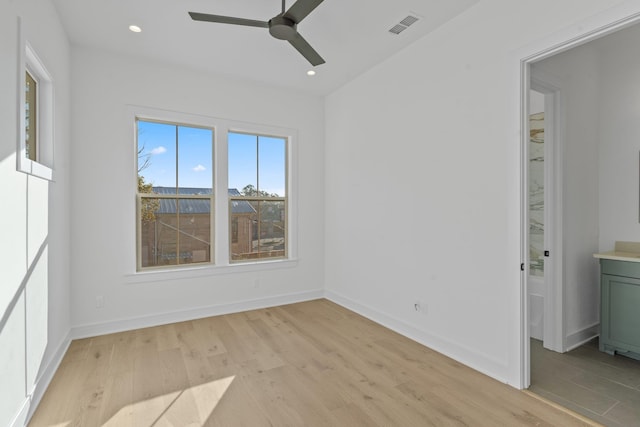 unfurnished bedroom featuring ceiling fan and light hardwood / wood-style flooring