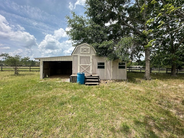 view of outdoor structure with an outdoor structure and fence