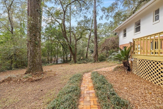 view of yard featuring a deck