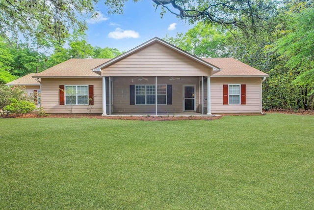 55 Hopkins Landing Rd, Quincy, FL 32351 - ranch-style home featuring ceiling fan, a front yard, a sunroom, and a shingled roof